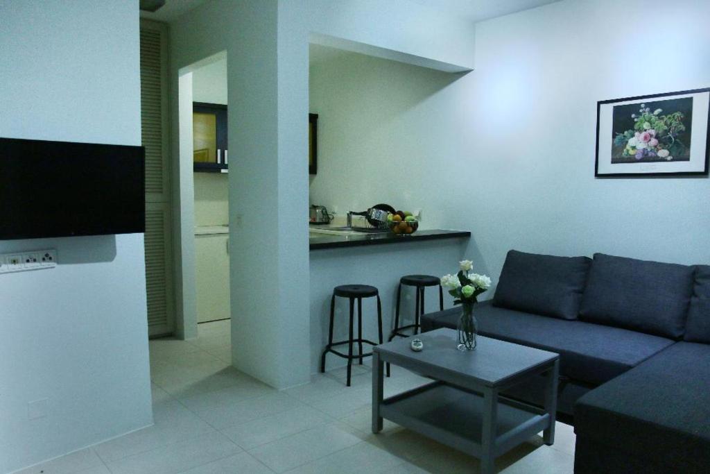 Televízia a/alebo spoločenská miestnosť v ubytovaní VIVIAN Art Apartments