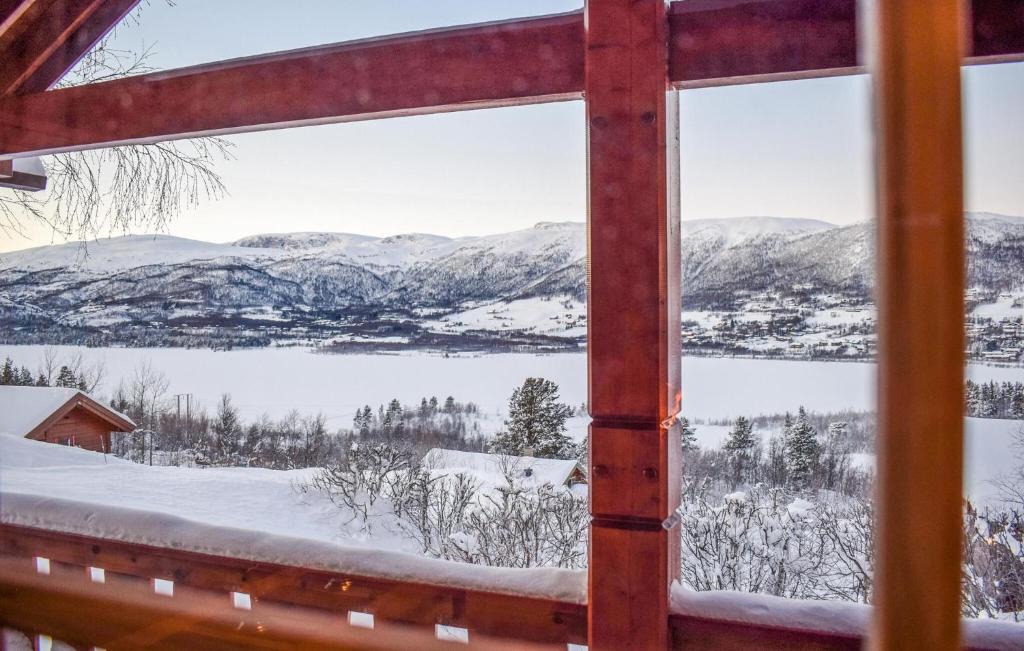 a window view of a snowy mountain view from a cabin at Lovely Home In Geilo With Wifi in Geilo