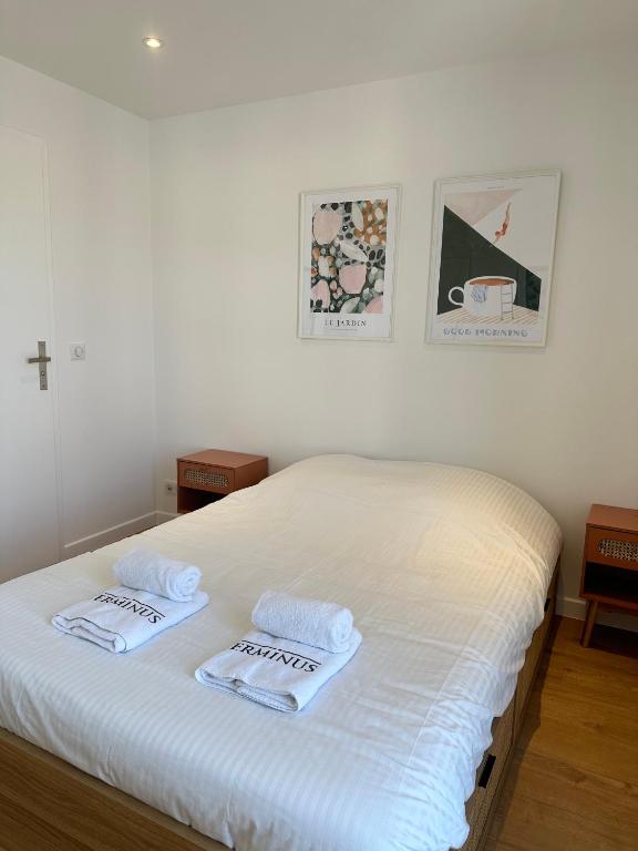Postel nebo postele na pokoji v ubytování Résidence Terminus - appartements