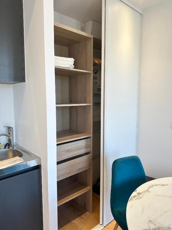 Postel nebo postele na pokoji v ubytování Résidence Terminus - appartements