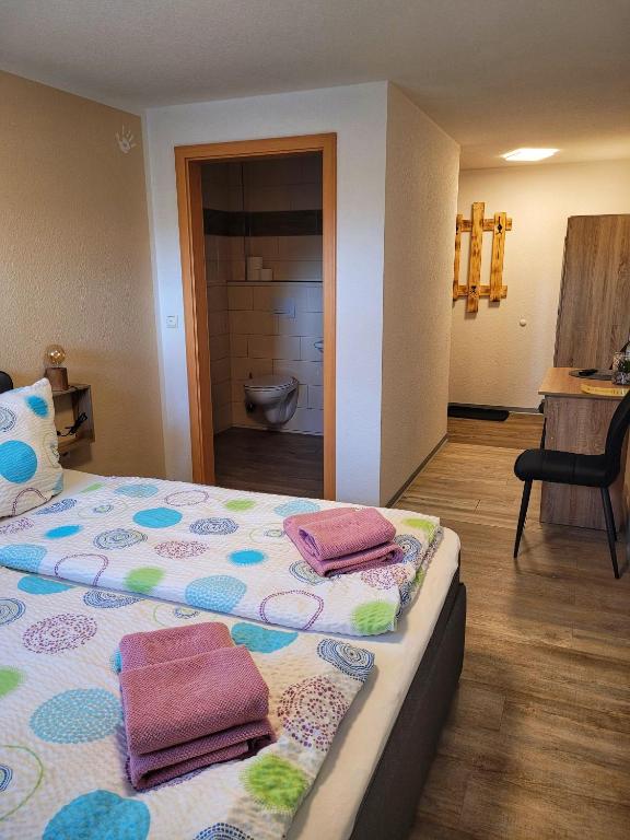 Postel nebo postele na pokoji v ubytování Kulturstätte Gröditz
