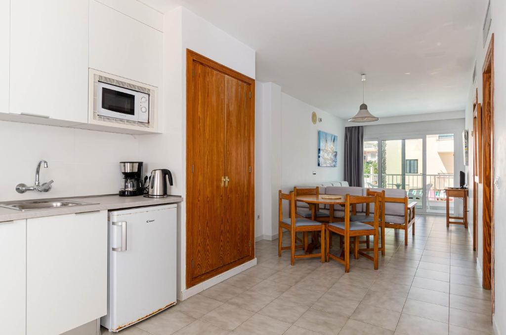 Kuchyň nebo kuchyňský kout v ubytování Mar Brava Apartments