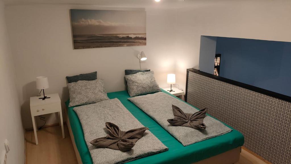 Postel nebo postele na pokoji v ubytování Super Central Apartment