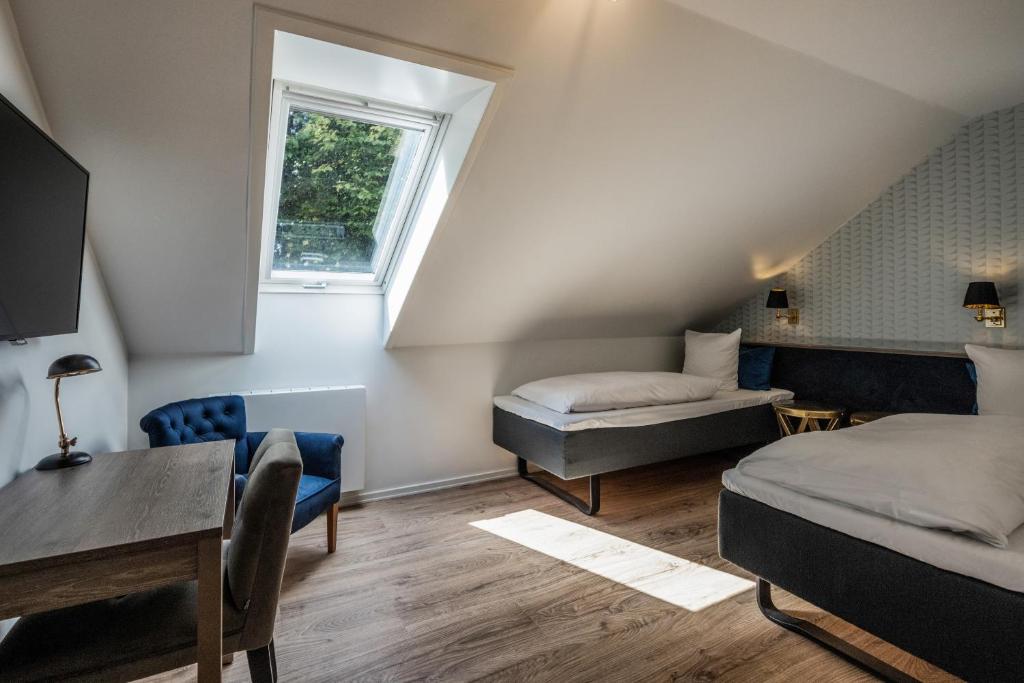 Postel nebo postele na pokoji v ubytování Hotel Scheelsminde