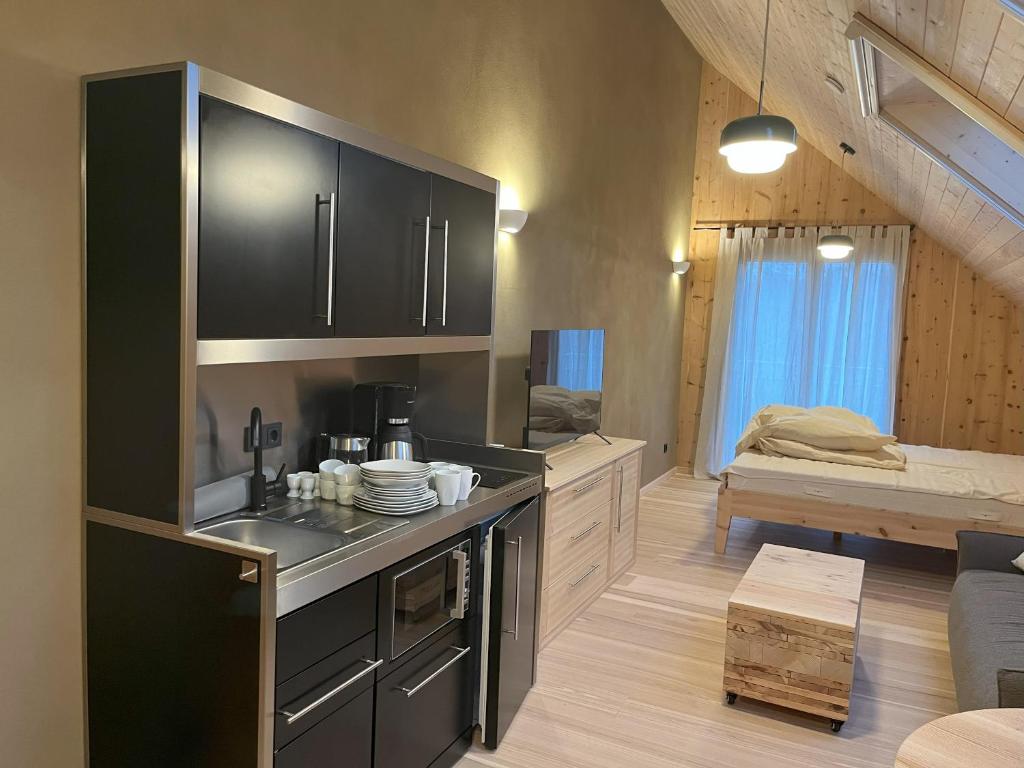 Kuchyň nebo kuchyňský kout v ubytování B&B Zirbenduft