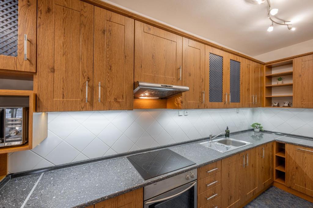 Kuchyň nebo kuchyňský kout v ubytování Apartmán Karin