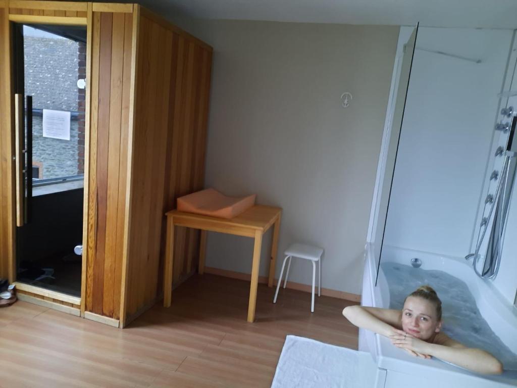 Postel nebo postele na pokoji v ubytování La Ferme Oubliée