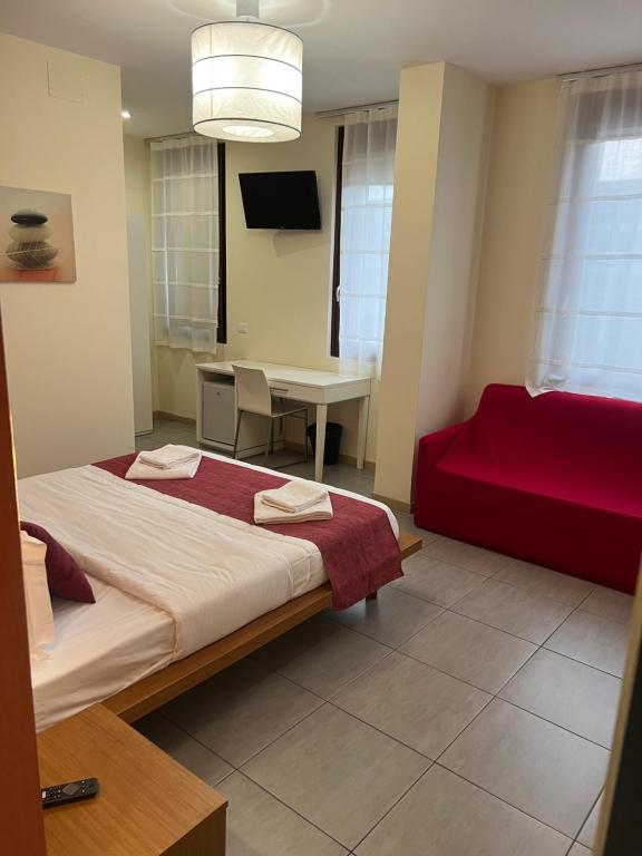 Postel nebo postele na pokoji v ubytování Cà Dei Barcaroli