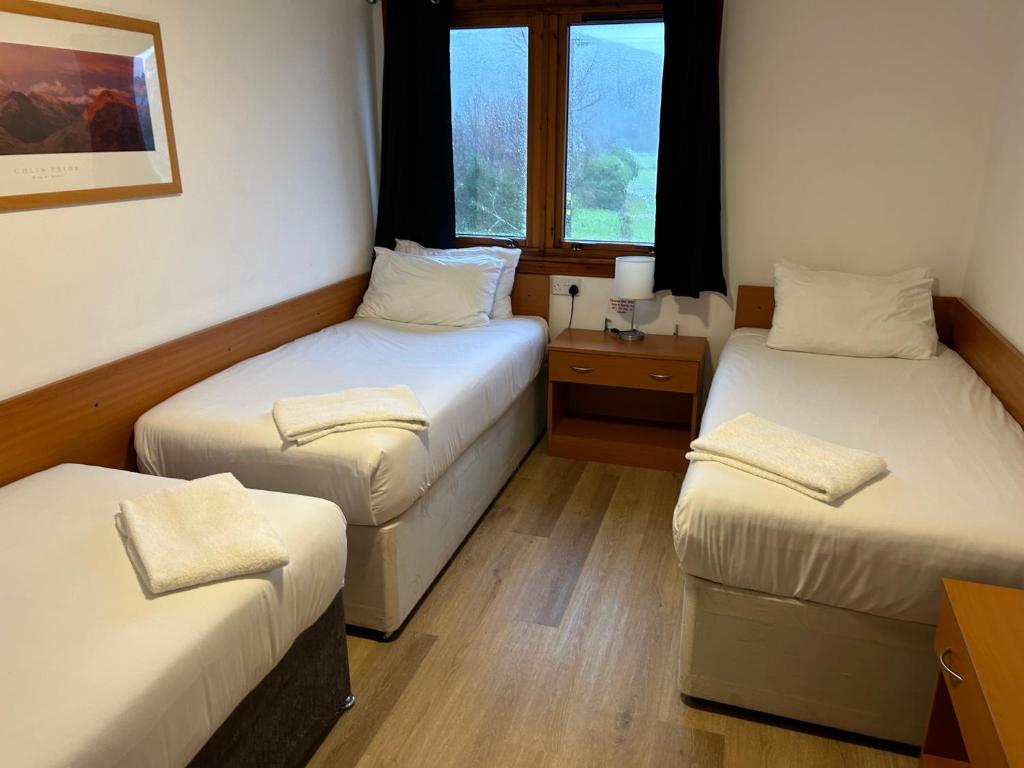 Postel nebo postele na pokoji v ubytování Roam West