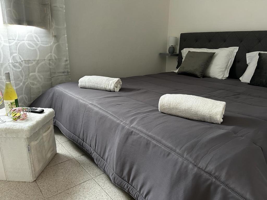Ein Bett oder Betten in einem Zimmer der Unterkunft Hiera BeB