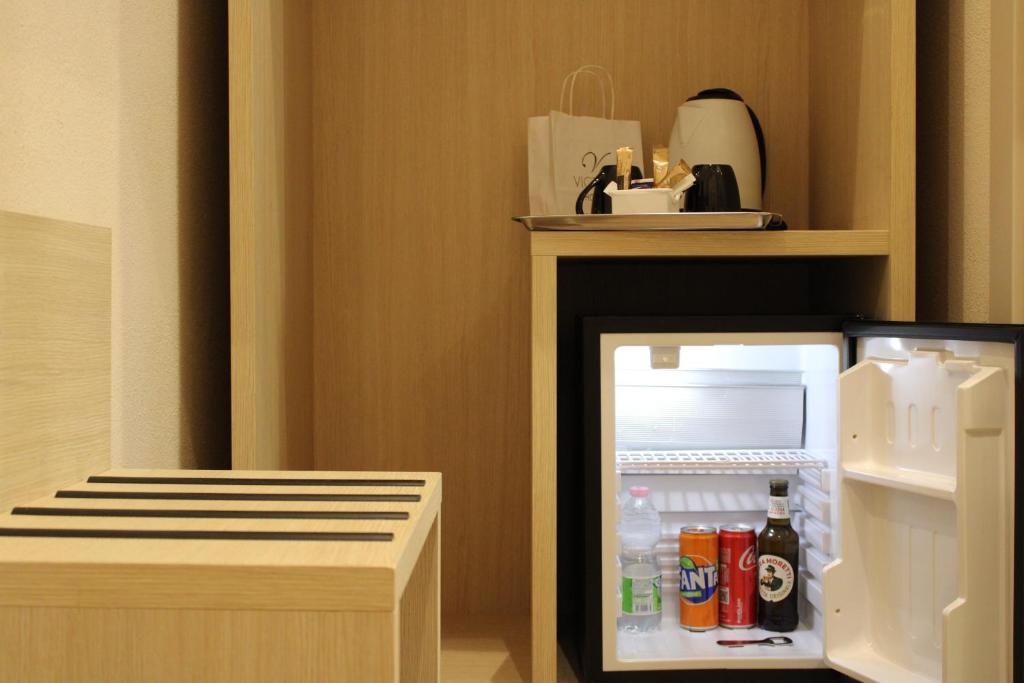 Kuchyň nebo kuchyňský kout v ubytování Hotel Victoria