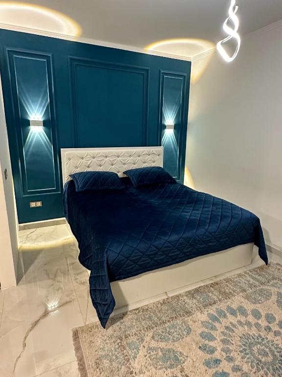 Llit o llits en una habitació de Yerevan Downtown