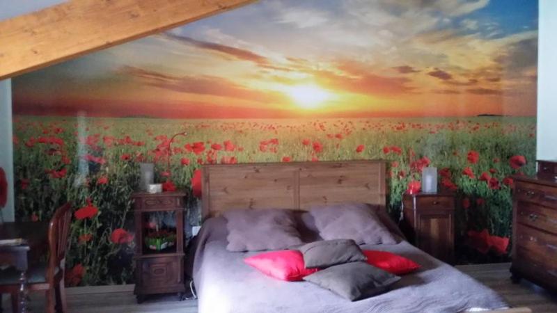 Postel nebo postele na pokoji v ubytování Chambre d'Hôtes Le Moulin d'Encor