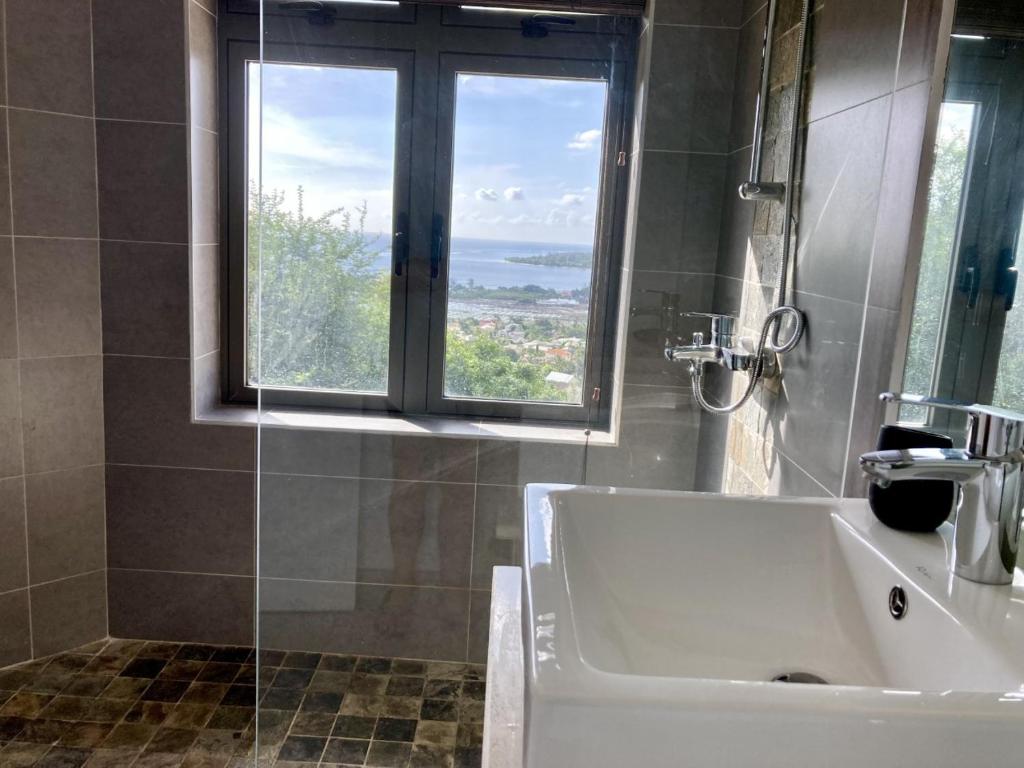 Koupelna v ubytování Villa Teranga avec vue panoramique sur la baie de Tamarin