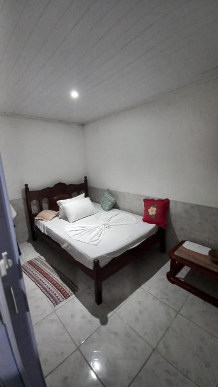 Postel nebo postele na pokoji v ubytování Casa na Gamboa do Morro