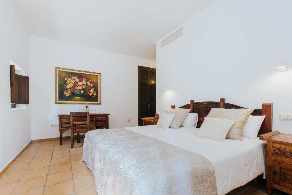 Postel nebo postele na pokoji v ubytování Villa & Guesthouse Paissa d'en Bernat