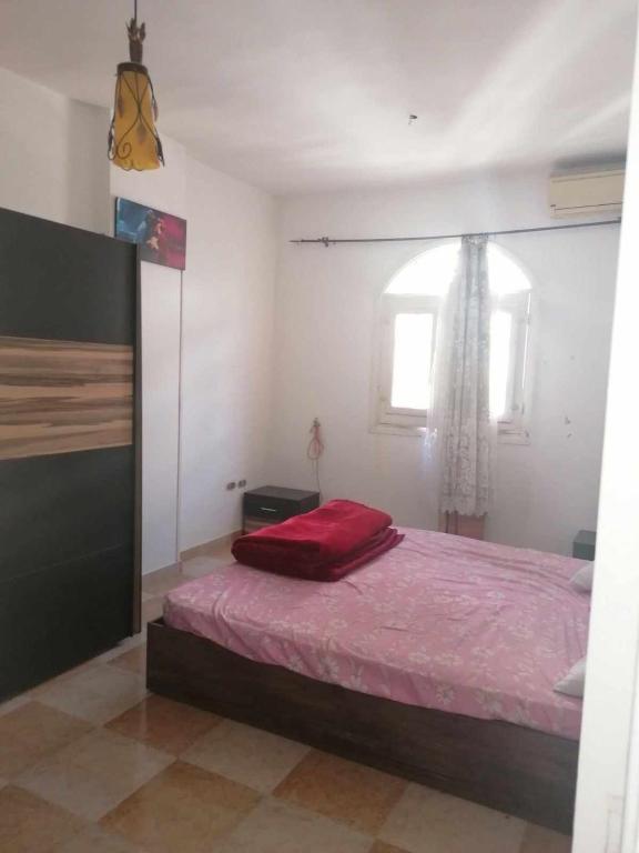 Postel nebo postele na pokoji v ubytování Sharks Bay Oasis Apartment Sharm El sheik