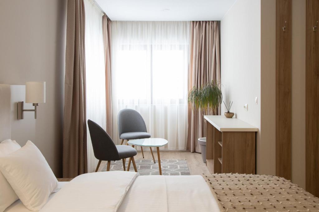 Postel nebo postele na pokoji v ubytování CASA ENCIAN