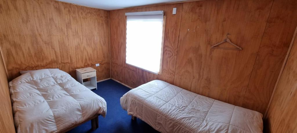 Llit o llits en una habitació de Casa en Dalcahue - Mira Mar