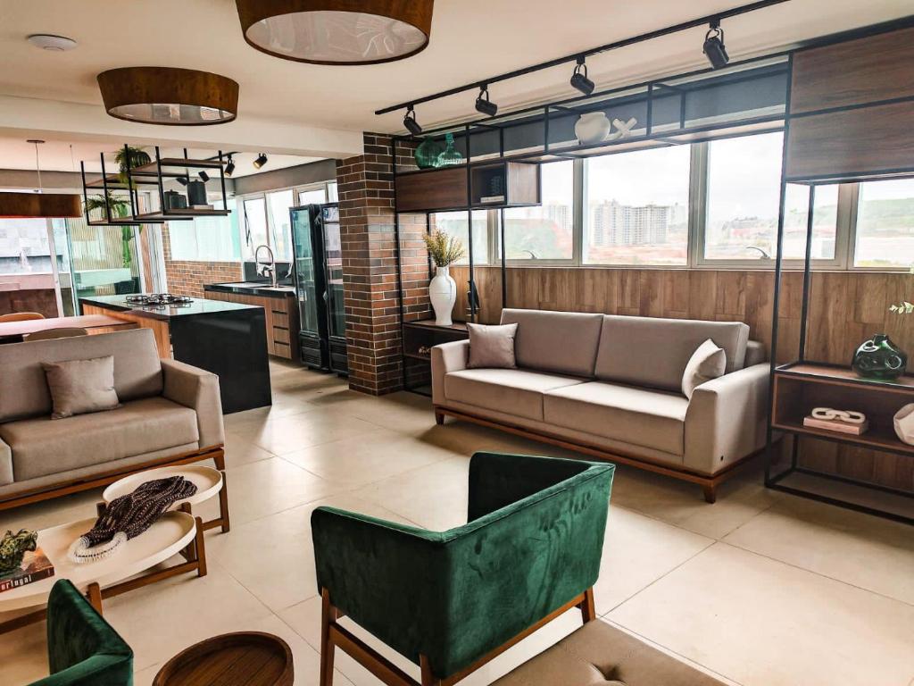 Posezení v ubytování LUXUOSO APARTAMENTO BEIRA-MAR COM SACADA em MACEIÓ