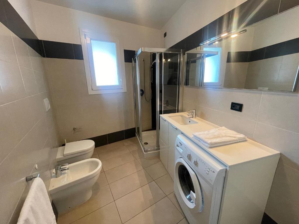 Koupelna v ubytování Villa Marina Apartments - Agenzia Cocal