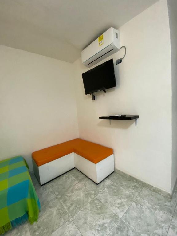 TV a/nebo společenská místnost v ubytování Patio de Getsemani