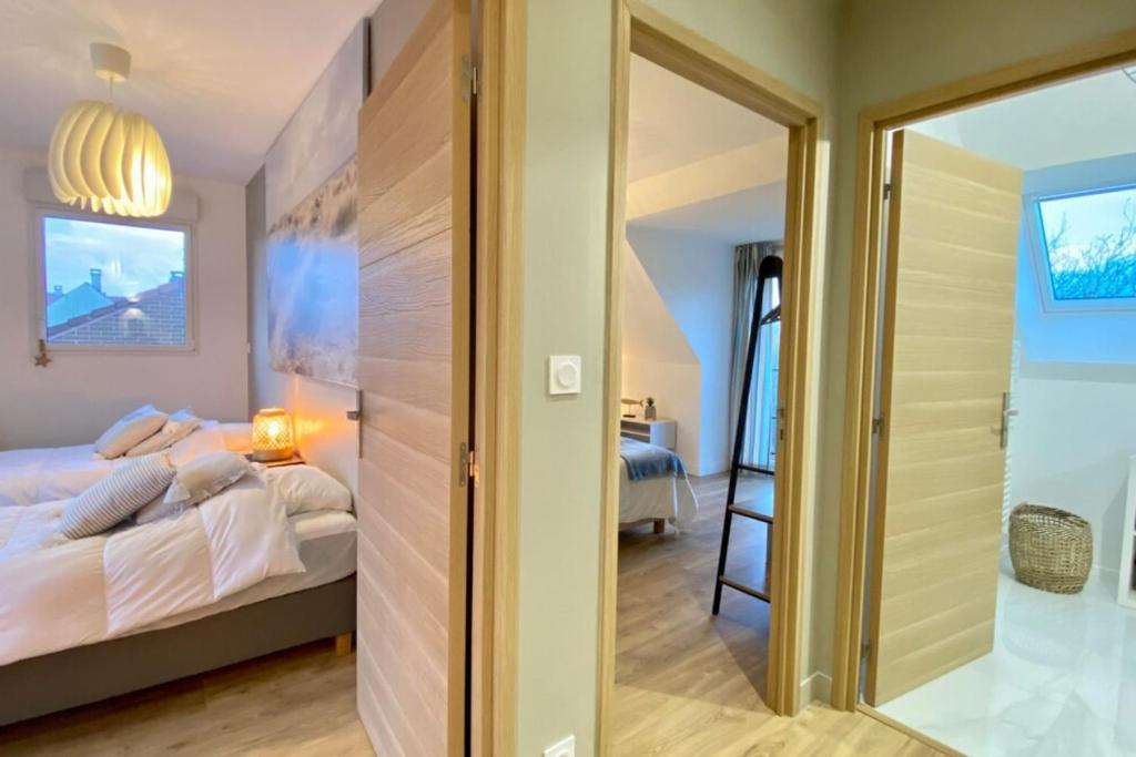 Posteľ alebo postele v izbe v ubytovaní Cosy cottage for 4 people with access to the dunes
