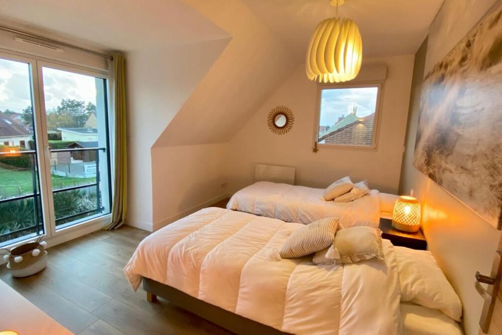 Posteľ alebo postele v izbe v ubytovaní Cosy cottage for 4 people with access to the dunes