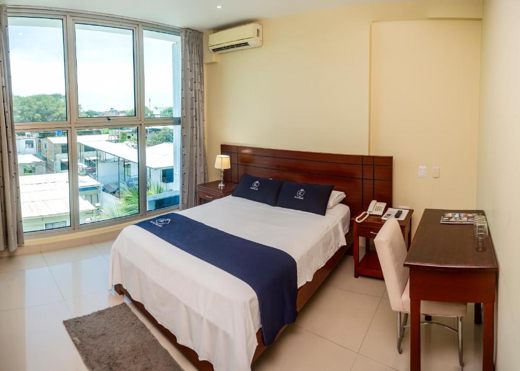 Voodi või voodid majutusasutuse LC Hoteles Piura toas