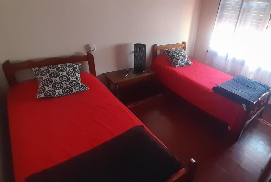 Postel nebo postele na pokoji v ubytování Casa Huésped Shalom