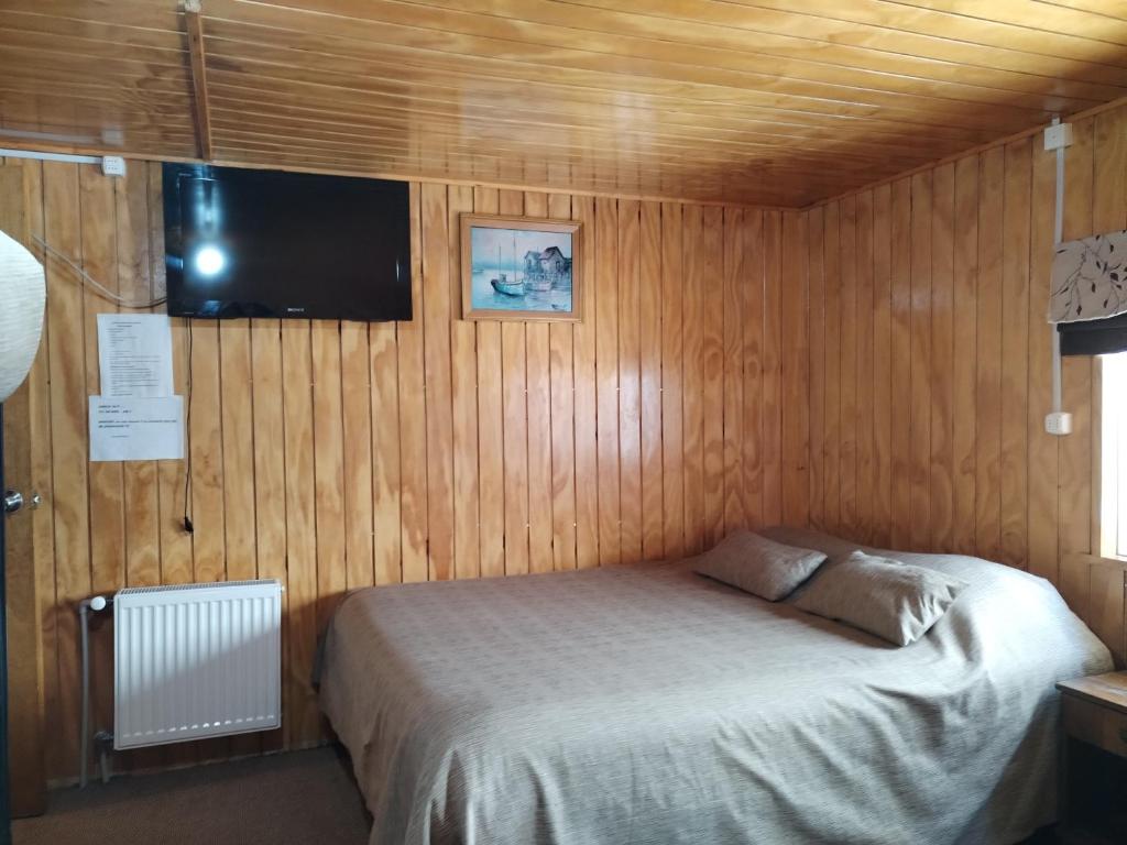 Postel nebo postele na pokoji v ubytování Hostal Copiapó Puerto Montt