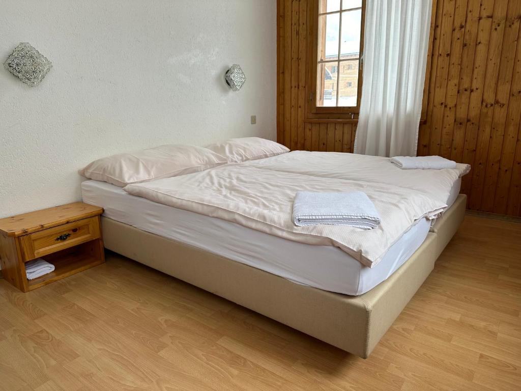 Postel nebo postele na pokoji v ubytování Hôtel - Petit-déjeuner Le Trift
