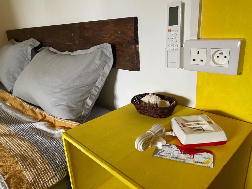 Postel nebo postele na pokoji v ubytování Kowlessur Residence