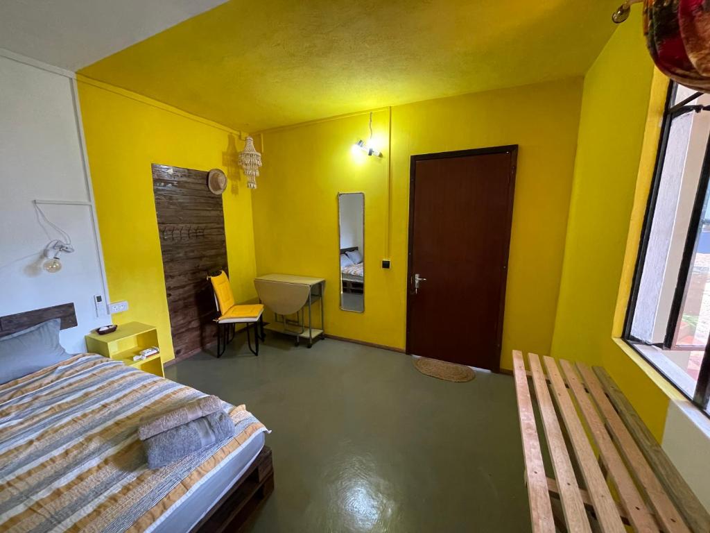 Postel nebo postele na pokoji v ubytování Kowlessur Residence