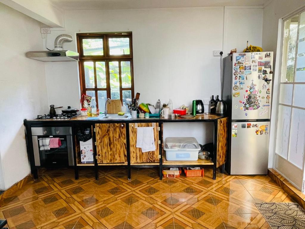 Kuchyň nebo kuchyňský kout v ubytování Kowlessur Residence