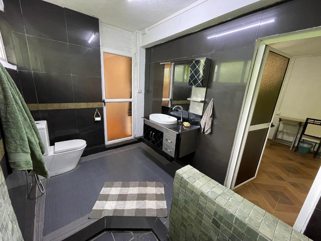 Postel nebo postele na pokoji v ubytování Kowlessur Residence