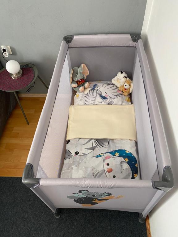 Postel nebo postele na pokoji v ubytování Apartma Ella