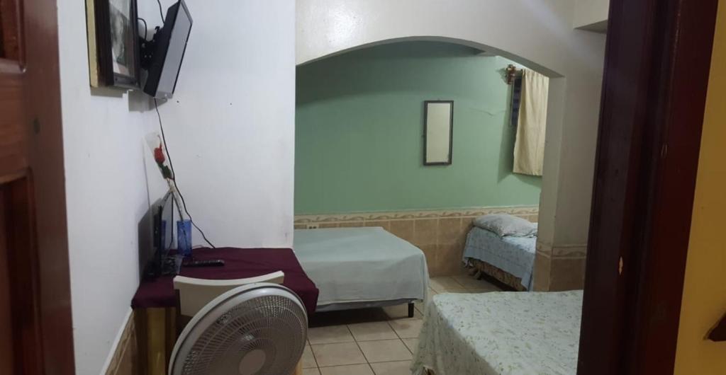 Postel nebo postele na pokoji v ubytování Hotel Gusto Bueno