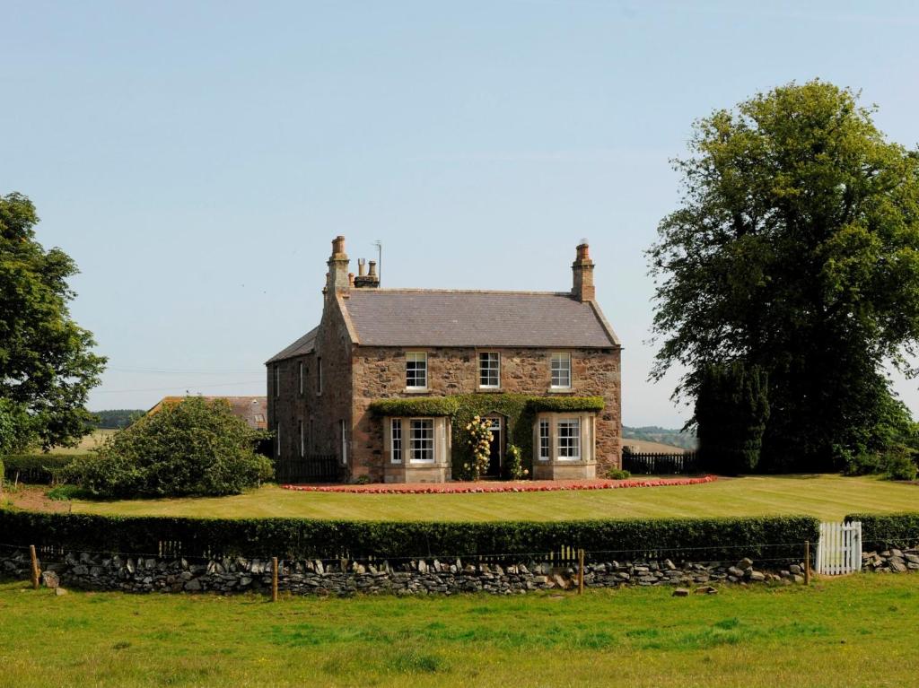 an old stone house on a green field at 5 bed in Chirnside 77337 in Duns