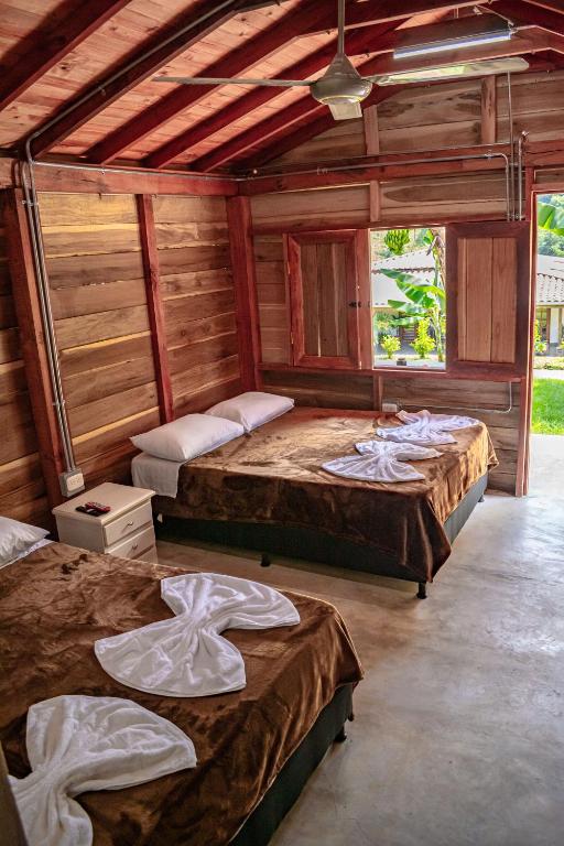 Postel nebo postele na pokoji v ubytování Hotel Campestre La Francesina