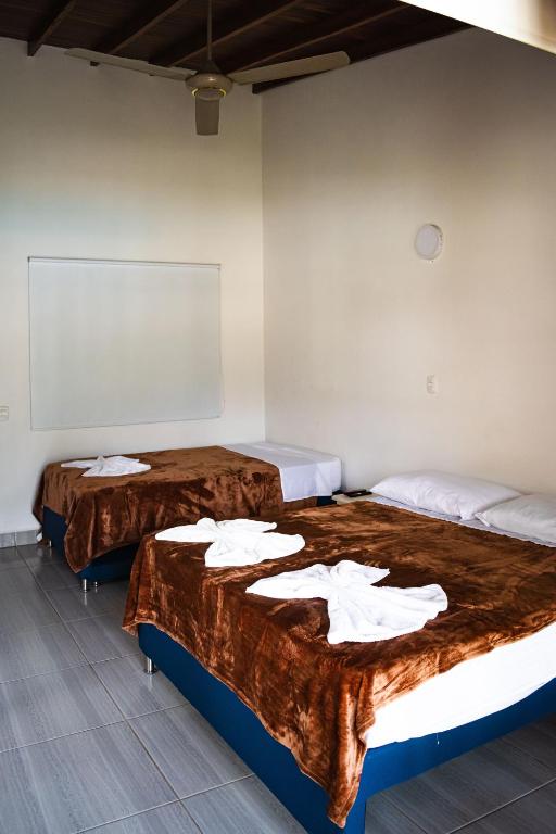 Postel nebo postele na pokoji v ubytování Hotel Campestre La Francesina