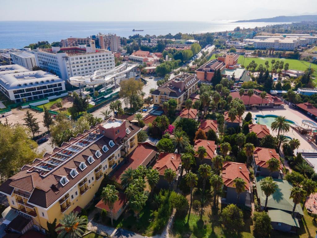 an aerial view of a city with buildings and trees at MIR'AMOR GARDEN Resort Hotel-ALL INCLUSIVE in Antalya