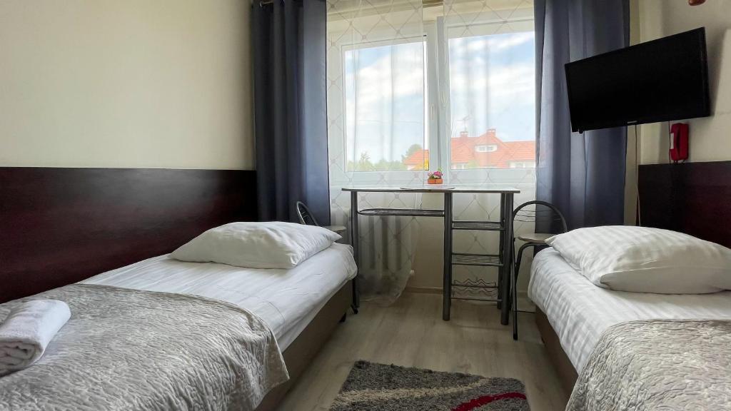 Postel nebo postele na pokoji v ubytování Mister
