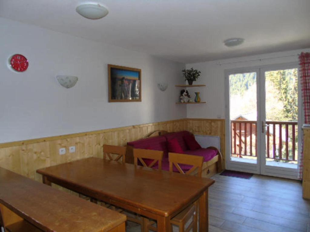 a living room with a couch and a table at Résidence Belvedere - 2 Pièces pour 6 Personnes MAE-4664 in Modane