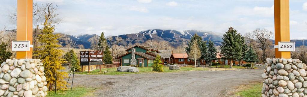 a house on the side of a road with a mountain at 7 Point Ranch in Emigrant