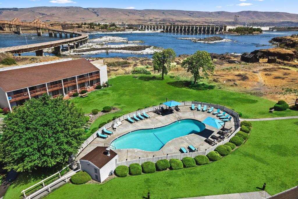 an aerial view of a resort with a swimming pool at Columbia River Hotel, Ascend Hotel Collection in The Dalles in The Dalles