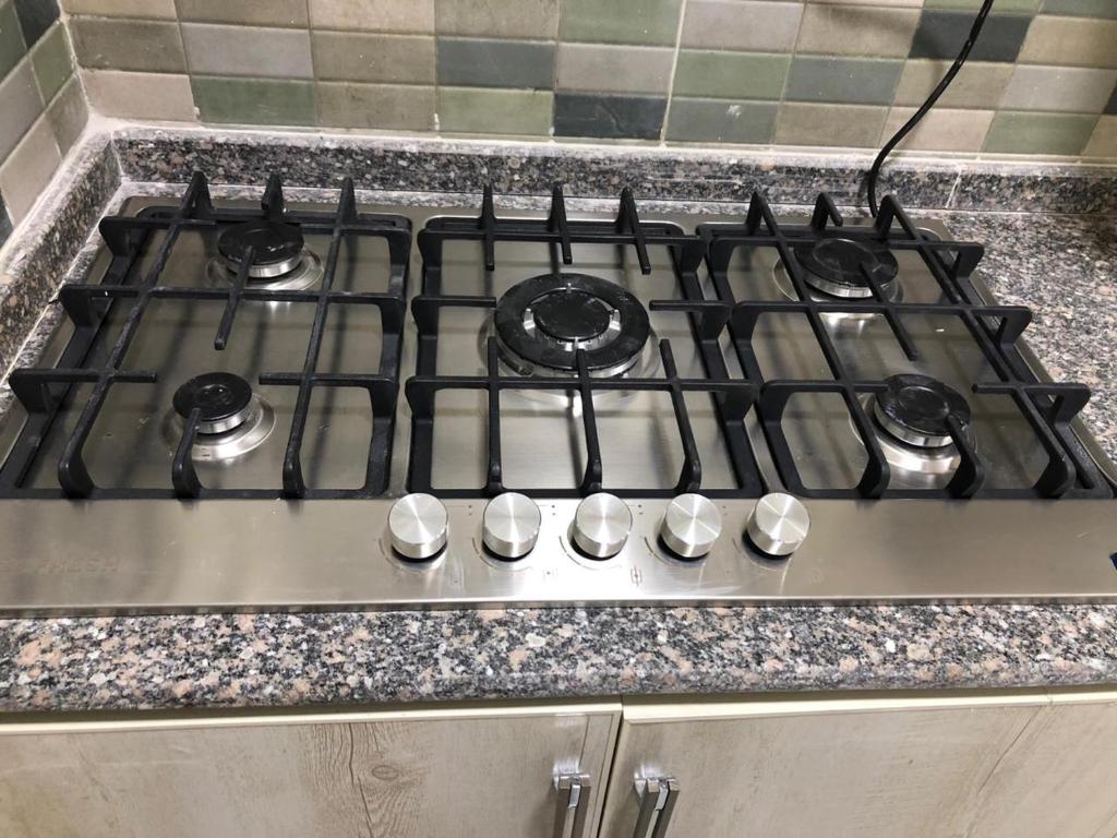 Kuchyň nebo kuchyňský kout v ubytování New Villa Carimo