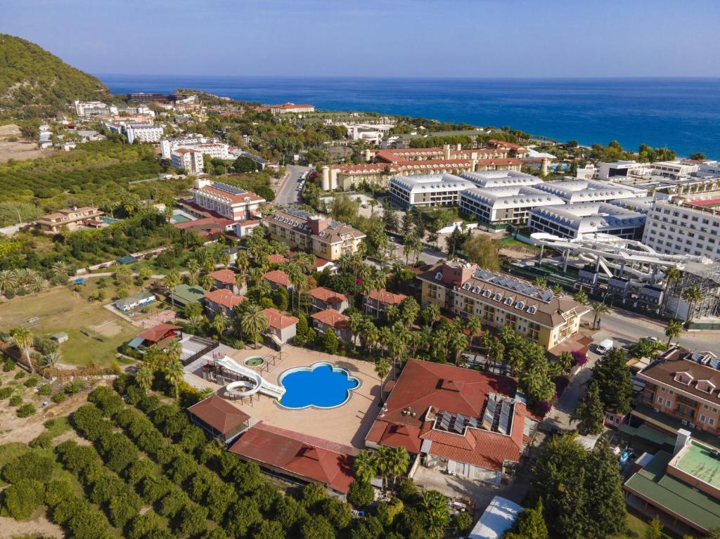 an aerial view of a city with buildings and the ocean at MIR'AMOR GARDEN Resort Hotel-ALL INCLUSIVE in Antalya