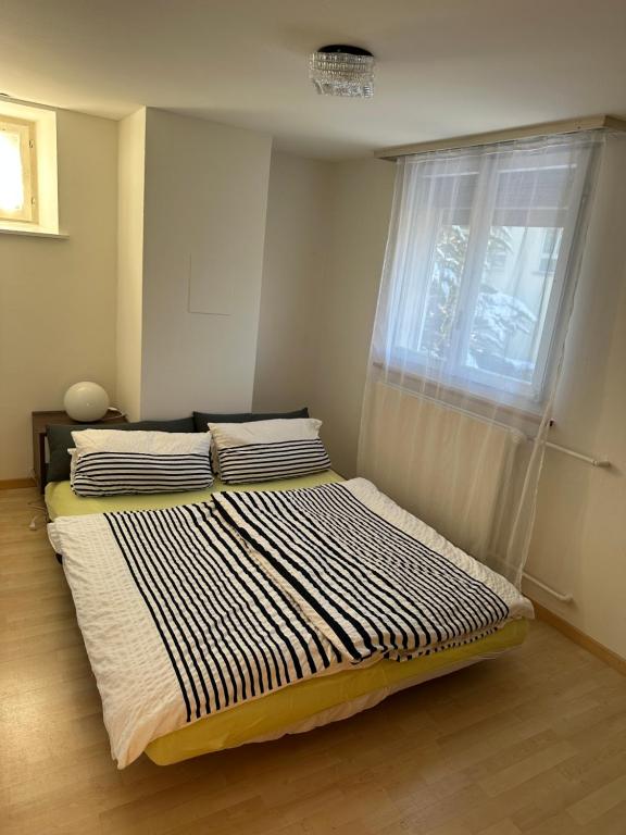 Postel nebo postele na pokoji v ubytování charmante 3,5 Zimmer Wohnung in Bauernhaus