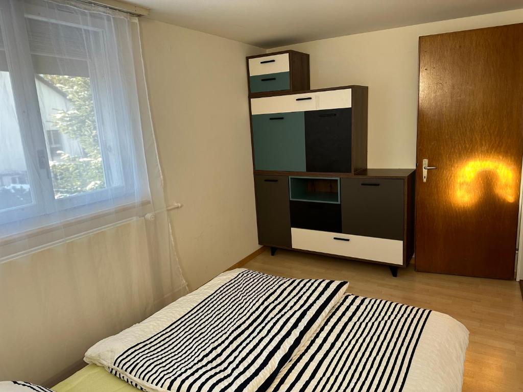 Postel nebo postele na pokoji v ubytování charmante 3,5 Zimmer Wohnung in Bauernhaus